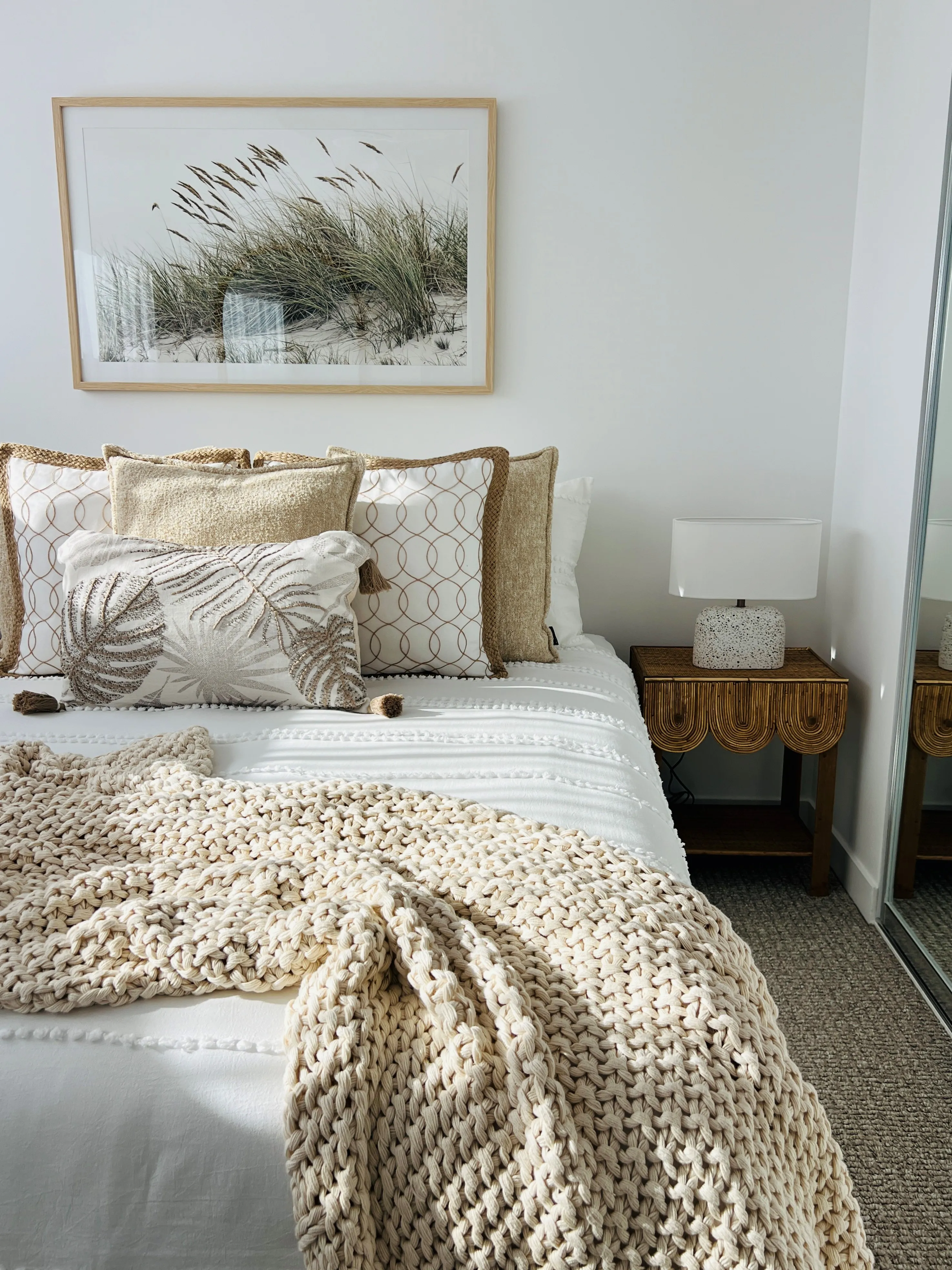 Third bedroom with neutral tones and natural textures
